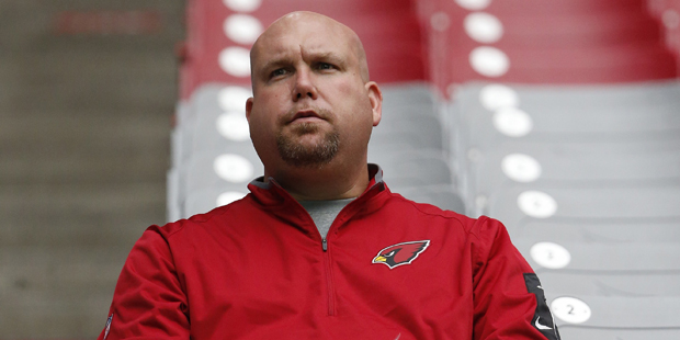 Arizona Cardinals general manager Steve Keim watches the offense and defense during an NFL football training camp practice Monday, Aug. 3, 2015, in Glendale, Ariz. (AP Photo/Ross D. Franklin)