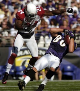 Arizona Cardinals safety Adrian Wilson, left, hits Baltimore Ravens tight end Todd Heap in the fourth quarter of their game Sunday, Sept. 23, 2007, in Baltimore. The Ravens won, 26-23. (AP Photo/ Steve Ruark)