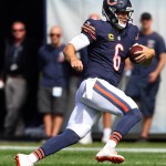 Chicago Bears quarterback Jay Cutler runs with the ball against the Arizona Cardinals during the first quarter of an NFL football game, Sunday, Sept. 20, 2015 in Chicaqo. (Steve Lundy/Daily Herald via AP) MANDATORY CREDIT; MAGS OUT