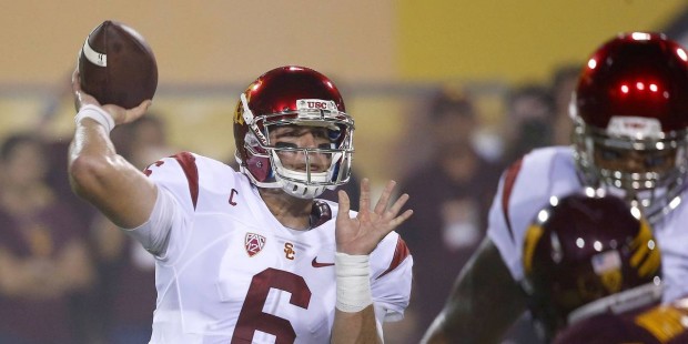 Southern California's Cody Kessler (6) throws a touchdown pass during the first half of an NCAA col...