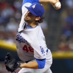 Los Angeles Dodgers starting pitcher Mike Bolsinger (46) throws against the Arizona Diamondbacks during the first inning of a baseball game, Saturday, Sept. 12, 2015, in Phoenix.  (AP Photo/Matt York)