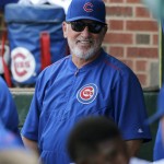 Chicago Cubs manager Joe Maddon smiles in the dugout during the ninth inning of a baseball game against the Arizona Diamondbacks Saturday, Sept. 5, 2015, in Chicago. The Cubs won 2-0. (AP Photo/Charles Rex Arbogast)