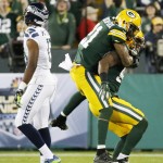 Green Bay Packers' Ha Ha Clinton-Dix (21) celebrates with Jayrone Elliott in front of Seattle Seahawks' Chris Matthews during the second half of an NFL football game Sunday, Sept. 20, 2015, in Green Bay, Wis. The Packers won 27-17. (AP Photo/Mike Roemer)
