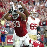 Arizona Cardinals defensive end Calais Campbell (93) signals safety during the second half of an NFL football game against the San Francisco 49ers, Sunday, Sept. 27, 2015, in Glendale, Ariz.  (AP Photo/Ross D. Franklin)