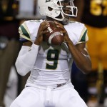 Cal Poly's Chris Brown looks to pass against Arizona State during the first half of an NCAA college football game Saturday, Sept. 12, 2015, in Tempe, Ariz. (AP Photo/Ross D. Franklin)