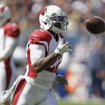 Arizona Cardinals safety Tony Jefferson (22) celebrates a touchdown after intercepting a pass during the first half of an NFL football game against the Chicago Bears, Sunday, Sept. 20, 2015, in Chicago. (AP Photo/Michael Conroy)