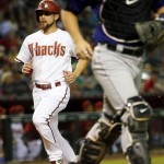 Arizona Diamondbacks right fielder Ender Inciarte scores on an RBI ground out by teammate Brandon Drury during the third inning of a baseball game against the against the Colorado Rockies, Tuesday, Sept. 29, 2015, in Phoenix. (AP Photo/Matt York)