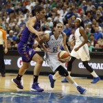 Minnesota Lynx guard Anna Cruz (51) drives the ball around Phoenix Mercury guard Marta Xargay (10) during the first half of Game 1 of the WNBA basketball Western Conference finals, Thursday, Sept. 24, 2015, in Minneapolis. (AP Photo/Stacy Bengs)