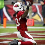 Arizona Cardinals running back Chris Johnson (23) celebrates his touchdown run against the San Francisco 49ers during the first half of an NFL football game, Sunday, Sept. 27, 2015, in Glendale, Ariz.  (AP Photo/Ross D. Franklin)