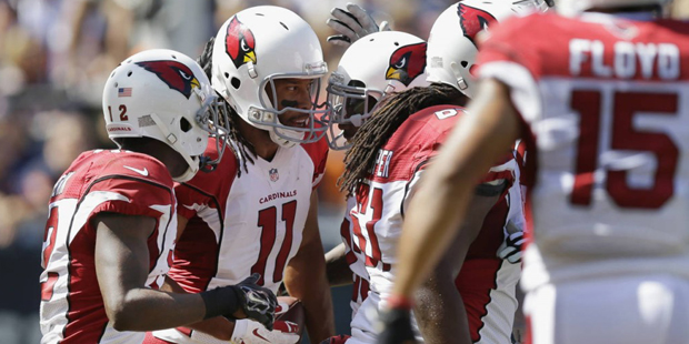 Arizona Cardinals wide receiver Larry Fitzgerald (11) celebrates his touchdown reception against th...
