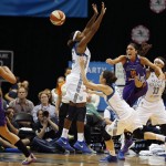 Phoenix Mercury guard Marta Xargay (10) tries to pass the ball to teammate forward Candice Dupree (4) during the first half of Game 1 of the WNBA basketball Western Conference finals against the Minnesota Lynx, Thursday, Sept. 24, 2015, in Minneapolis. (AP Photo/Stacy Bengs)
