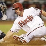 Arizona Diamondbacks' Paul Goldschmidt slides home safely in the sixth inning on a ball hit by Welington Castillo during a baseball game against the San Diego Padres, Tuesday, Sept. 15, 2015, in Phoenix. (AP Photo/Rick Scuteri)