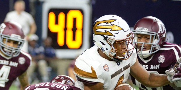 Arizona State running back Demario Richard (4) fumbles the ball as he is hit by the Texas A&M defen...