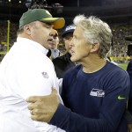 Green Bay Packers head coach Mike McCarthy talks to Seattle Seahawks head coach Pete Carroll after an NFL football game Sunday, Sept. 20, 2015, in Green Bay, Wis. The Packers won 27-17. (AP Photo/Jeffrey Phelps)