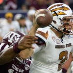 Arizona State quarterback Mike Bercovici (2) is pressured as he passes by Texas A&M defensive lineman Myles Garrett (15) during the first half of an NCAA football game on Saturday, Sept. 5, 2015, in Houston. (AP Photo/George Bridges)