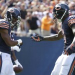 Chicago Bears wide receiver Josh Bellamy, right, celebrates his touchdown with wide receiver Marquess Wilson (10) during the first half of an NFL football game against the Arizona Cardinals, Sunday, Sept. 20, 2015, in Chicago. (AP Photo/Michael Conroy)