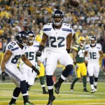 Seattle Seahawks' Fred Jackson celebrates after catching a touchdown pass during the second half of an NFL football game against the Green Bay Packers Sunday, Sept. 20, 2015, in Green Bay, Wis. (AP Photo/Mike Roemer)