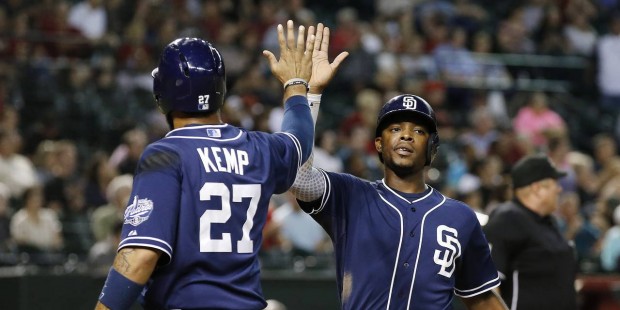 San Diego Padres' Matt Kemp (27) and Justin Upton, right, celebrate after both scored run against t...