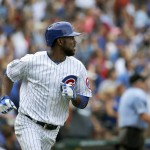 Chicago Cubs Dexter Fowler watches his home run off Arizona Diamondbacks starting pitcher Robbie Ray, during the fifth inning of a baseball game Saturday, Sept. 5, 2015, in Chicago. (AP Photo/Charles Rex Arbogast)