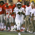 Arizona State running back Demario Richard (4) carries for a 93-yard touchdown run during the second half of an NCAA college football game against New Mexico, Friday, Sept. 18, 2015, in Tempe, Ariz. (AP Photo/Matt York)