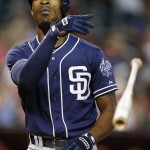 San Diego Padres' Melvin Upton Jr. tosses his bat away after striking out against the Arizona Diamondbacks during the fourth inning of a baseball game Wednesday, Sept. 16, 2015, in Phoenix. (AP Photo/Ross D. Franklin)