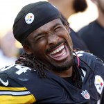 Pittsburgh Steelers running back DeAngelo Williams (34) celebrates with teammates on the sidelines after rushing for his third touchdown of the game during the second half of an NFL football game against the San Francisco 49ers in Pittsburgh, Sunday, Sept. 20, 2015. The Steelers won 43-18. (AP Photo/Gene J. Puskar)