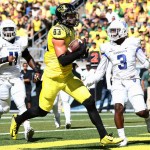 Oregon tight end Johnny Mundt (83) scores a touchdown during the third quarter of an NCAA college football game against Georgia State, Saturday, Sept. 19, 2015, in Eugene, Ore. (AP Photo/Ryan Kang)