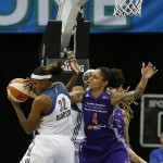 Minnesota Lynx forward Rebekkah Brunson (32) grabs a rebound ball from Phoenix Mercury forward Candice Dupree (4) during the second half of Game 1 of the WNBA basketball Western Conference finals, Thursday, Sept. 24, 2015, in Minneapolis. The Lynx won 67-60. (AP Photo/Stacy Bengs)