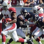 Arizona Cardinals kick returner David Johnson (31) runs the opening kickoff or a touchdown during the first half of an NFL football game against the Chicago Bears, Sunday, Sept. 20, 2015, in Chicago. (AP Photo/David Banks)