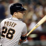 San Francisco Giants' Buster Posey hits a single in the first inning during a baseball game against the Arizona Diamondbacks, Monday, Sept. 7, 2015, in Phoenix. (AP Photo/Rick Scuteri)