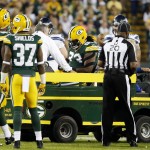 Green Bay Packers' Josh Boyd leaves the game on a cart during the first half of an NFL football game against the Seattle Seahawks Sunday, Sept. 20, 2015, in Green Bay, Wis. (AP Photo/Mike Roemer)