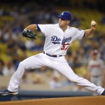 Los Angeles Dodgers starting pitcher Alex Wood throws to the plate during the first inning of a baseball game against the Arizona Diamondbacks, Tuesday, Sept. 22, 2015, in Los Angeles. (AP Photo/Mark J. Terrill)