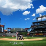 The Arizona Diamondbacks play against the Colorado Rockies in an almost empty Coors Field during the first inning of the first game of a baseball double header Tuesday, Sept. 1, 2015, in Denver. (AP Photo/Jack Dempsey)