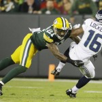Seattle Seahawks' Tyler Lockett (16) catches a pass for a first down with Green Bay Packers' Ha Ha Clinton-Dix (21) defending during the second half of an NFL football game Sunday, Sept. 20, 2015, in Green Bay, Wis. (AP Photo/Morry Gash)
