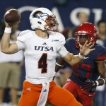 UTSA quarterback Blake Bogenschutz (4) throws down field against Arizona during the first half of an NCAA college football game, Thursday, Sept. 3, 2015, in Tucson, Ariz. (AP Photo/Rick Scuteri)