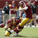Washington Redskins' Dustin Hopkins, right, kicks a field goal during the first half of an NFL football game against the St. Louis Rams in Landover, Md., Sunday, Sept. 20, 2015. (AP Photo/Alex Brandon)