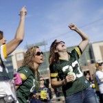 Fans tailgate before an NFL football game between the Green Bay Packers and the Seattle Seahawks Sunday, Sept. 20, 2015, in Green Bay, Wis. (AP Photo/Jeffrey Phelps)