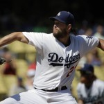 Los Angeles Dodgers starting pitcher Clayton Kershaw  throws against the Arizona Diamondbacks during the first inning of a baseball game in Los Angeles, Thursday, Sept. 24, 2015. (AP Photo/Chris Carlson)