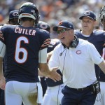 Chicago Bears head coach John Fox celebrates a touchdown with quarterback Jay Cutler (6) during the first half of an NFL football game against the Arizona Cardinals, Sunday, Sept. 20, 2015, in Chicago. (AP Photo/David Banks)