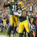 Green Bay Packers' Richard Rodgers is congratulated by Randall Cobb (18) after catching a touchdown pass during the second half of an NFL football game against the Seattle Seahawks Sunday, Sept. 20, 2015, in Green Bay, Wis. (AP Photo/Mike Roemer)