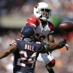 Chicago Bears cornerback Alan Ball (24) breaks up a pass intended for Arizona Cardinals wide receiver John Brown (12) during the first half of an NFL football game, Sunday, Sept. 20, 2015, in Chicago. The play was called interference against the Bears. (AP Photo/Michael Conroy)