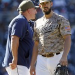 San Diego Padres interim manager Pat Murphy, left, pulls starting pitcher James Shields from the game during the seventh inning of a baseball game against the Arizona Diamondbacks in San Diego, Sunday, Sept. 27, 2015. (AP Photo/Alex Gallardo)