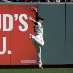 San Francisco Giants left fielder Juan Perez makes a leaping catch on a line drive by Arizona Diamondbacks' A.J. Pollock during the second inning of a baseball game on Saturday, Sept. 19, 2015, in San Francisco. (AP Photo/Marcio Jose Sanchez)