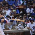 Chicago Cubs Miguel Montero hits a grand slam off a pitch delivered by Arizona Diamondbacks' Matt Reynolds in the sixth inning of a baseball game on Sunday, Sept. 6, 2015, in Chicago. (AP Photo/Matt Marton)