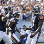 Chicago Bears wide receiver Josh Bellamy (11) celebrates his touchdown with teammates during the first half of an NFL football game against the Arizona Cardinals, Sunday, Sept. 20, 2015, in Chicago. (AP Photo/Michael Conroy)