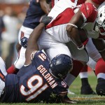 Chicago Bears defensive tackle Eddie Goldman (91) tackles Arizona Cardinals running back David Johnson (31) during the first half of an NFL football game, Sunday, Sept. 20, 2015, in Chicago. (AP Photo/Michael Conroy)