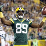 Green Bay Packers' James Jones celebrates a touchdown catch during the first half of an NFL football game against the Seattle Seahawks Sunday, Sept. 20, 2015, in Green Bay, Wis. (AP Photo/Mike Roemer)