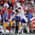 Oregon State's Seth Collins leaps during a run in the first half of an NCAA college football game against San Jose State in Corvallis, Ore., Saturday, Sept. 19, 2015. (AP Photo/Timothy J. Gonzalez)