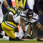 Seattle Seahawks' K.J. Wright (50) recovers a fumble by Green Bay Packers James Starks (44) during the first half of an NFL football game, Sunday, Sept. 20, 2015 at Lambeau Field in Green Bay, Wis. (Wm. Glasheen/The Post-Crescent via AP) NO SALES