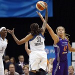 Minnesota Lynx guard Seimone Augustus (33) snags a rebound ball from Phoenix Mercury center Brittney Griner (42) during the first half of Game 1 of the WNBA basketball Western Conference finals, Thursday, Sept. 24, 2015, in Minneapolis. (AP Photo/Stacy Bengs)